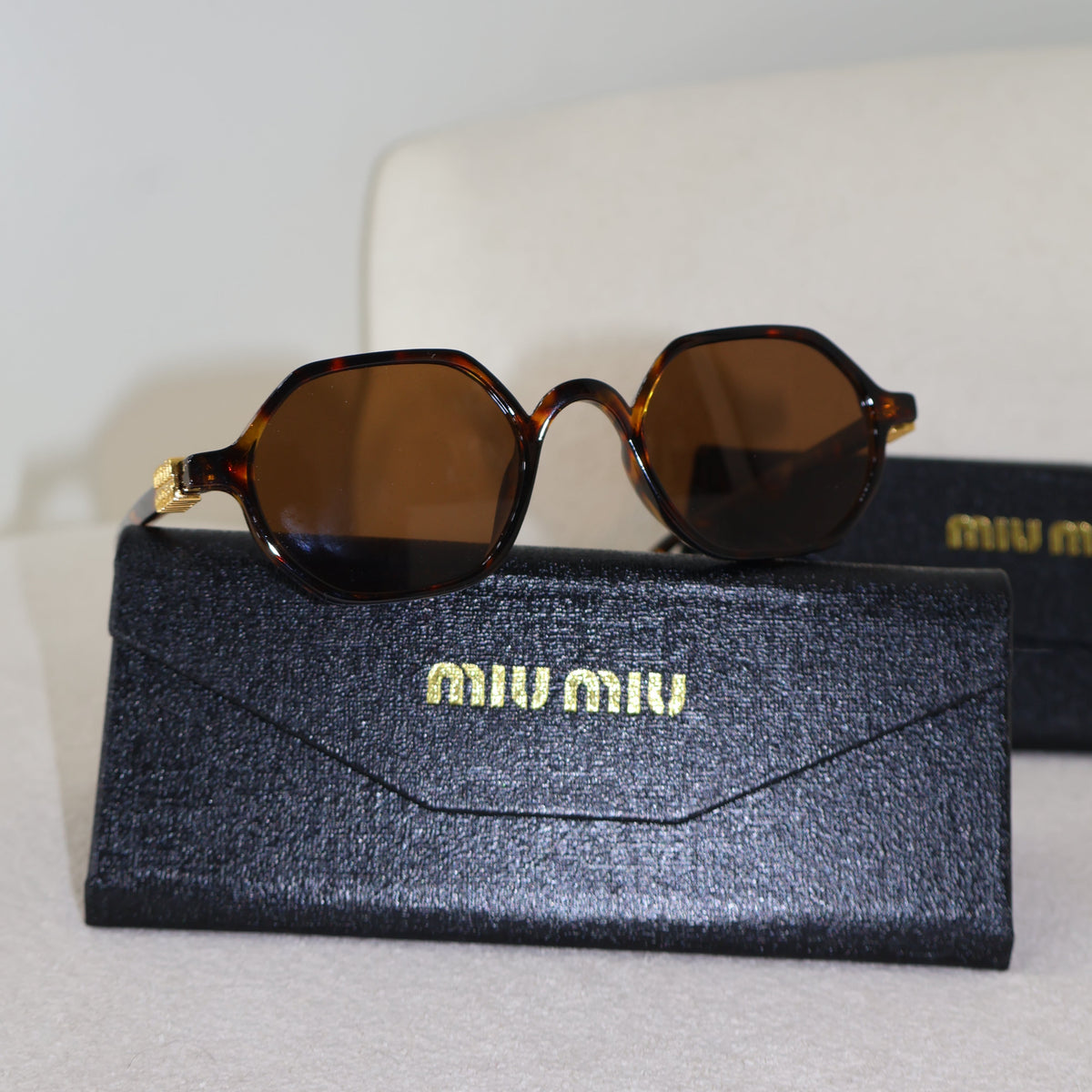 ÓCULOS MIUMIU VERÃO
