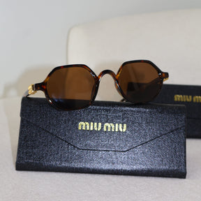 ÓCULOS MIUMIU VERÃO