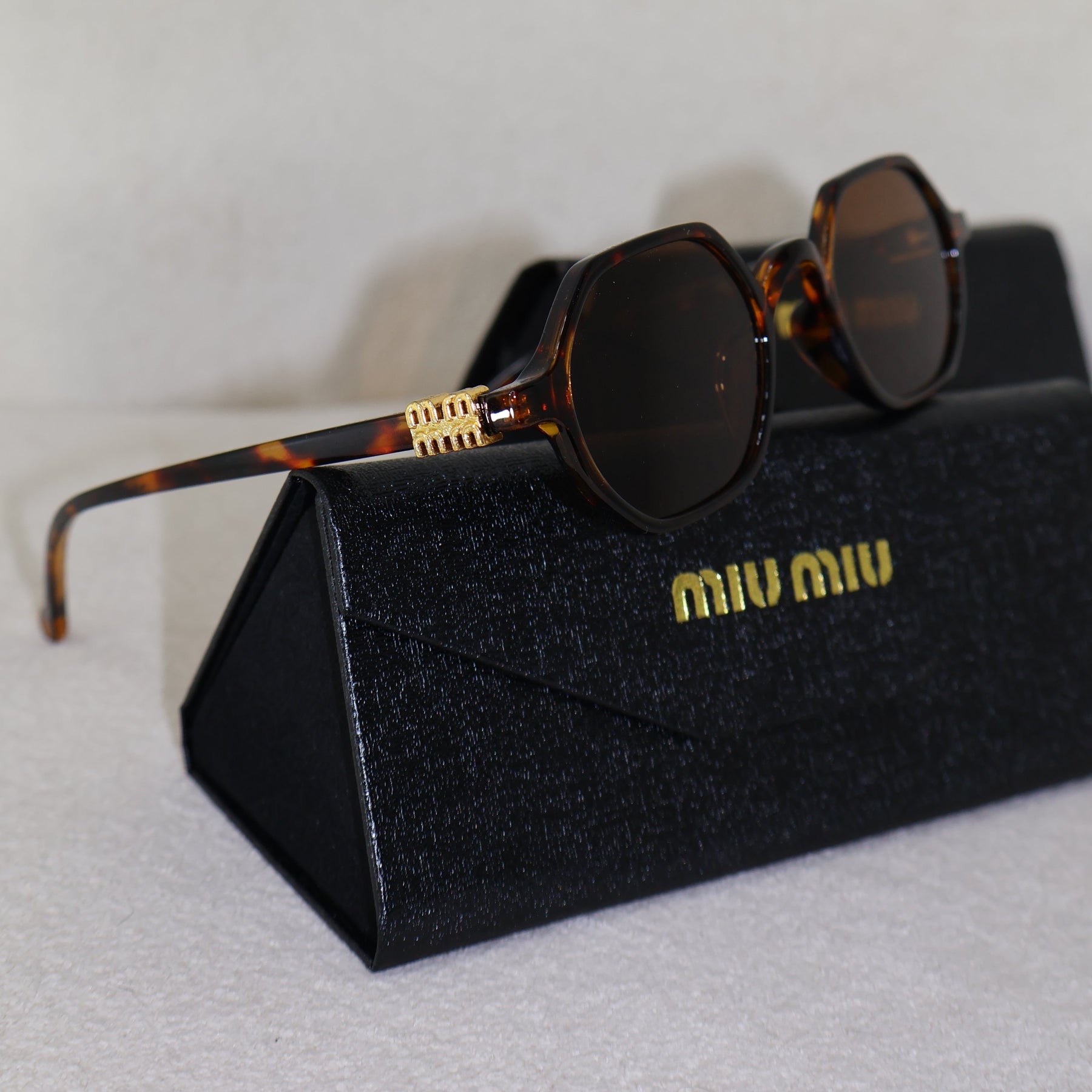 ÓCULOS MIUMIU VERÃO