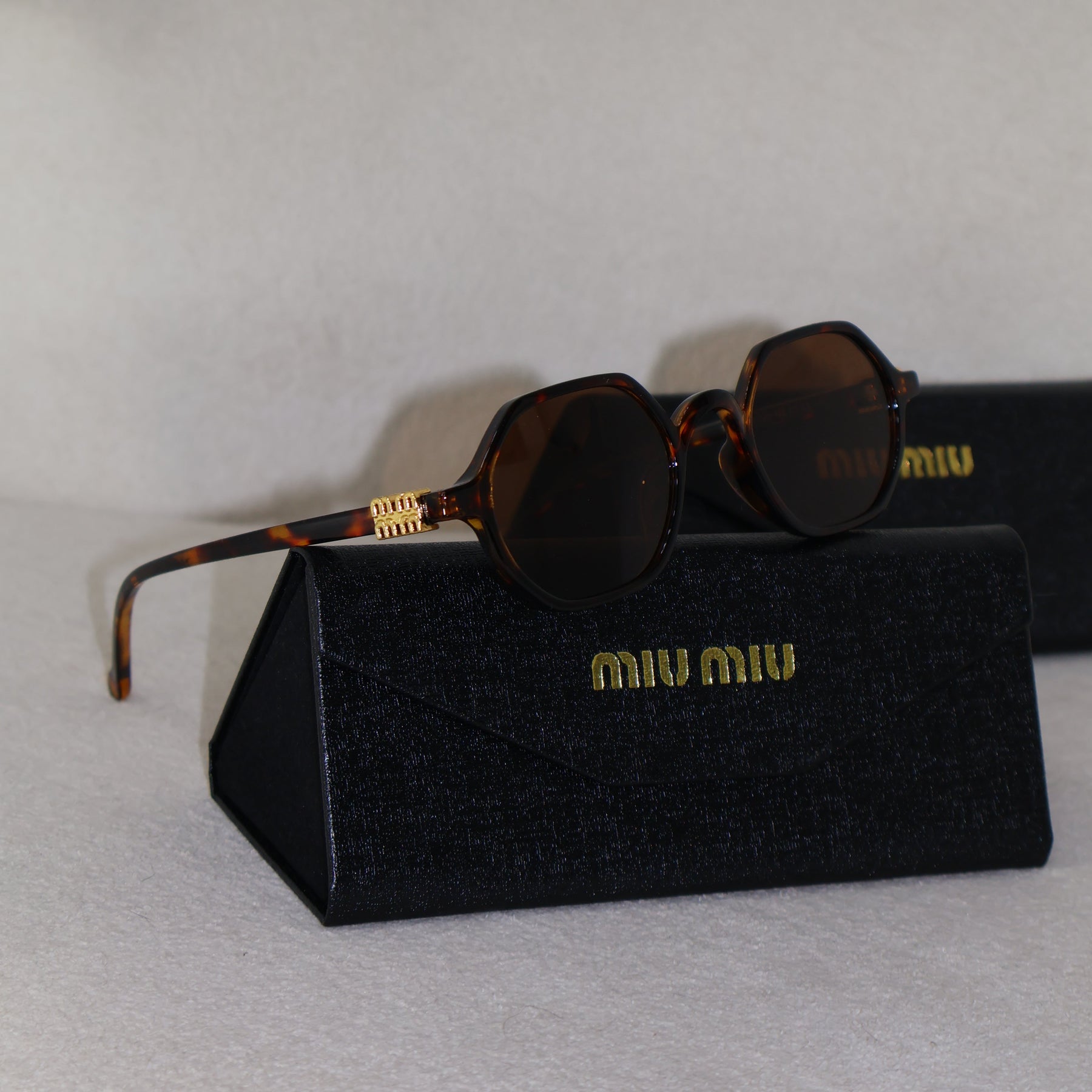 ÓCULOS MIUMIU VERÃO